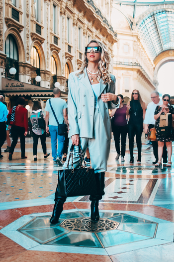 Karen Huggins wearing a pale blue Escada suit