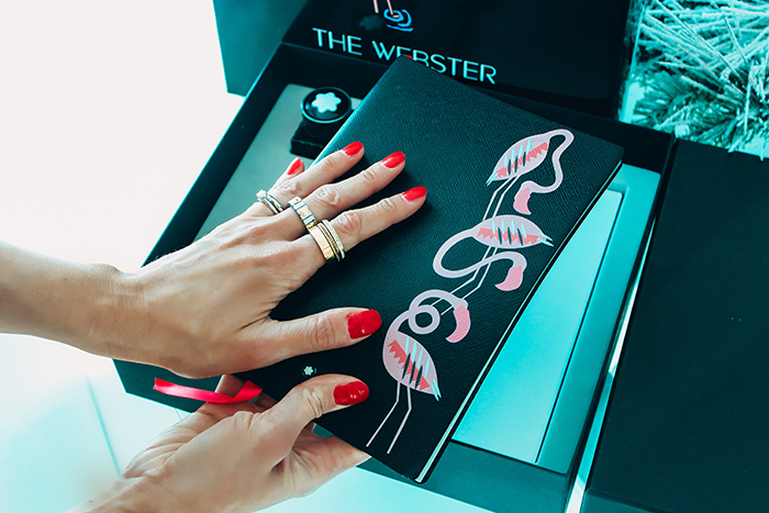 Close-up of the Montblanc and The Webster notebook with pink flamingo design