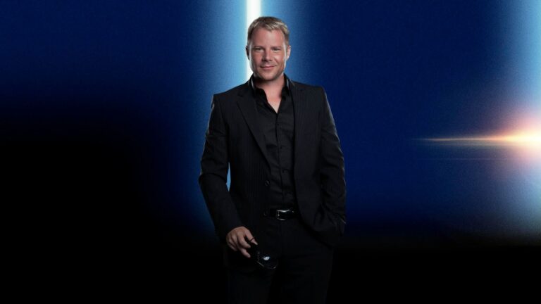 Chris Lavoie photographed in a black suit for his exclusive Miami SHOOT Magazine Q&A on creativity, imagination, resilience, and personal growth.