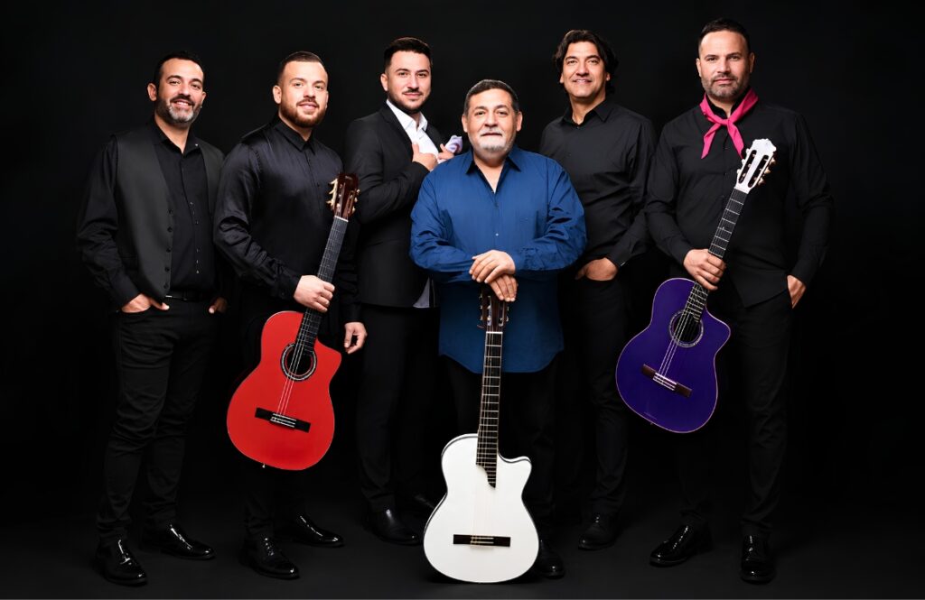Gipsy Kings featuring Tonino Baliardo pose with guitars ahead of their Historia Tour performance in Miami on August 15, 2026.