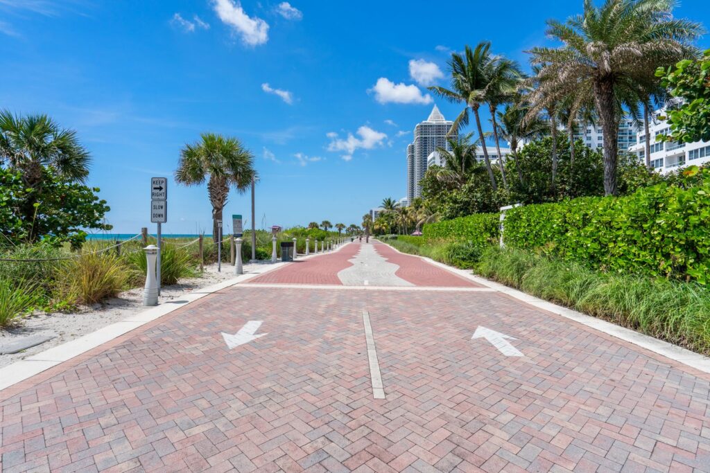 Miami Beach pedestrian and bicycle path lined with palms and coastal landscaping