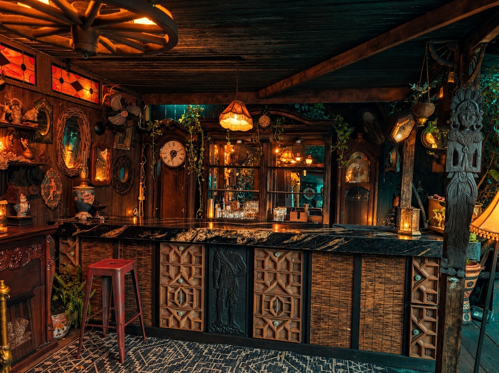 Bar with ornate panels and vintage objects